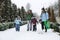 Outdoors winter activities for family, friends. Happy Family, friends, two women, two boy kids and dog, mothers and sons