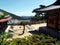 Outer courtyard of the Beomeosa Buddhist temple complex with the mountains in the background. Busan, Korea