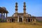 Outer view of Kevada Masjid has minarets, globe like domes and narrow stairs, UNESCO protected Champaner - Pavagadh Archaeologica