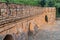 Outer wall of Rajon Ki Baoli step well in the Mehrauli Archaeological Park in Delhi, Ind