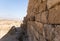 The outer  wall of the Roman baths on the territory ruins of the Nabataean city of Avdat, located on the incense road in the