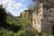 The outer  walls of the ruins of crusader Fortress Chateau Neuf - Metsudat Hunin is located at the entrance to the Israeli