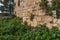 The outer  walls of the ruins of crusader Fortress Chateau Neuf - Metsudat Hunin is located at the entrance to the Israeli