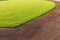 Outfield Grass And Warning Track Dirt Of Baseball Field