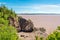 Outflow in the Bay of Fundy - view of the exposed coast, Canada