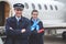 Outgoing workers standing near aircraft