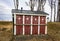 Outhouse toilet with four closed and locked doors