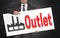 Outlet poster is held by businessman