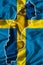 Outline map of Sweden against the background of a waving textile Swedish flag. 3D illustration