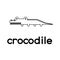 Outlined cute cartoon crocodile