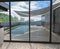 Outlook of modern style house poolside, 3D rendering