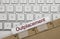 Outplacement - Inscription on White Keyboard Key