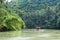 Outrigger boat on a tropical river