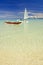 Outrigger canoes on sandy beach