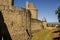 Outside walls of Porte Narbonnaise at Carcassonne in France