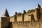 Outside walls of Porte Narbonnaise at Carcassonne in France