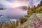 Outstanding autumn scene of foggy and sunny morning on Almsee lake