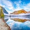 Outstanding autumn scene of foggy and sunny morning on Almsee lake