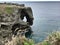 The outstanding cliff and a dazzling view of emerald ocean at Cape Manzamo in Japan.