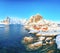 Outstanding winter view on Hamnoy village and Festhaeltinden mountain on background