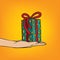Outstretched hand with gift box