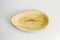 Oval Areca Leaf Tray, eco-friendly disposable cutlery. Top view on a white background