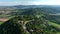 OVARO MIONE, ITALY - APRIL, 2023: Aerial drone view of a valley in the morning with clouds. Small mauntain village Mione