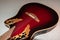 Ovation acoustic guitar in red product shot