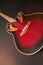 Ovation acoustic guitar in red product shot