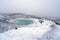 Ovelooking ice covered Viti volcanic crater near Krafla geothermal area in Iceland.