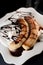 Oven Bananas with chocolate and whipped cream