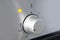 Oven cooking temperature control knob. Kitchen equipment panel detail