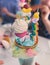 Over shake and freak shake, process of cooking extreme colorful milkshakes on a kids birthday party celebration, catering banquet