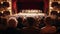 Over-the-shoulder view of a theater audience watching a stage performance, capturing the atmosphere