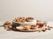 over white background dried fruits and nuts arranged on podium