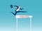 Overcome obstacles and success concept. Businessman holding briefcase jumping over hurdle race obstacle.