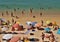 Overcrowded Atlantic beach in Armacao de Pera, Algarve - Portugal