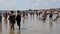 Overcrowded beach scene in Maine