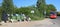 Overcrowded garbage cans next to the bus stop