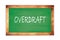 OVERDRAFT text written on green school board