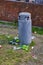 Overfilled dustbin in a public park in downtown Berlin