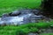 Overflow Stream over rocks, Coniston, UK