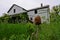 Overgrown Abandonment: Weathered House Reclaimed by Nature in Indiana