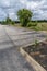 Overgrown Empty Parking Lot of Failed Restaurant After Pandemic