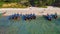 Overhead aerial view of Long Tail Boats on a beautiful topical Thailand beach