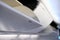 overhead baggage compartment in airplane. aircraft cabin