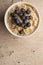 Overhead of Bowl of Porridge with Blueberries on Top Copy Space