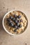 Overhead Closeup of a Bowl of Porridge with Blueberries on Top