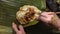 Overhead closeup shot of asian food on a giant leaf