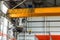 Overhead crane with hook in engineering plant shop